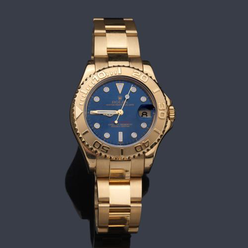  ROLEX Oyster Perpetual Date Yach Master Superlative Chronometer Officially Certified ref. 168623 modelo cadete con caja y brazalete en oro de 18 K.
