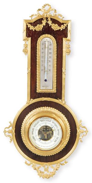  Barómetro y termómetro estilo Louis XVI en bronce dorado y caoba con decoración de lazos y guirnaldas,  Francia finales S. XIX