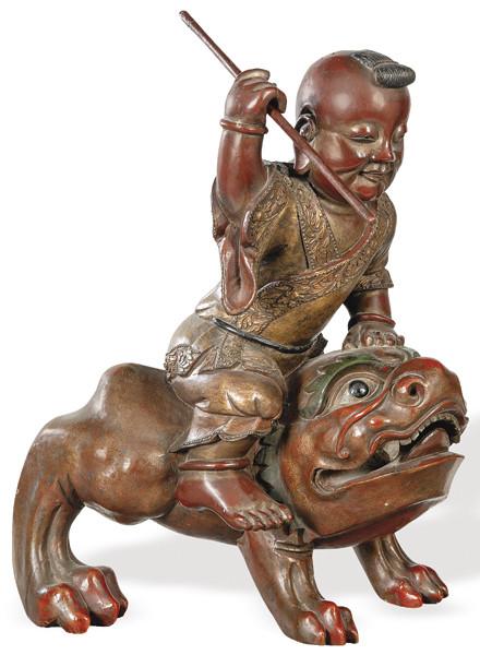  Cazador sobre Perro de Foo en madera tallada, lacada y policromada, China Dinastía Qing  h. 1900